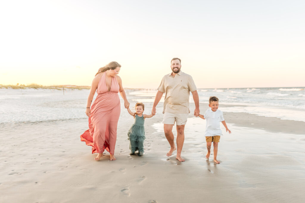 St. Augustine Family Photographer | Timeless Memories on Florida’s Historic Coast 1 Family walking barefoot on St. Augustine Beach at sunset – St. Augustine family photographer