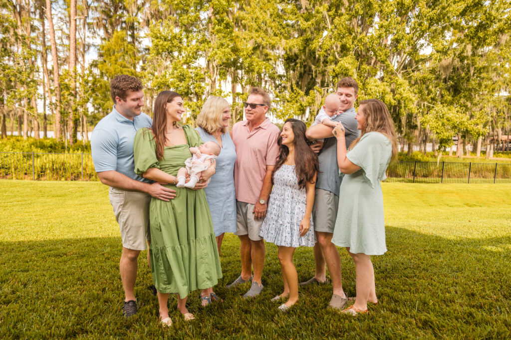 Candid family moment in oak hammock at Mead Botanical Garden Winter Park during sunrise