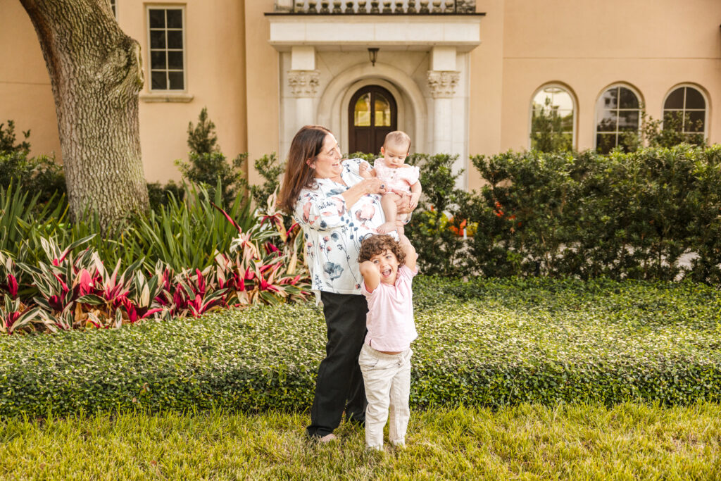 randmother with grandchildren during backyard session Winter Park Florida